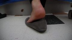 Candid Shot Of Feet In Ballerina Flats