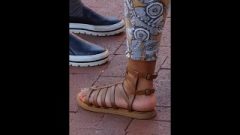 Steamy Ebony Feet In Brown Sandals