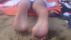 Candid Feet In The Beach