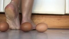 Red Nails Barefoot Feet Crushing Eggs