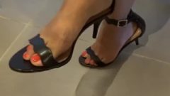 Friend Toe Tapping In Kitchen, Kitten Heeled Sandals With Red Toes )