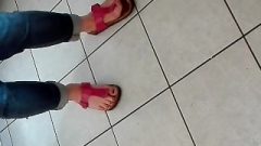 Suggestive Feet In Pink Shoes Of A MILF