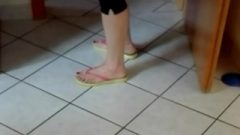 Naked Feet And Yellow Flip Flops