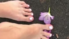 Stunning Feet Crushing Flowers