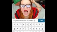 Perfect Chick With Glasses Opens Mouth And Flashes Feet