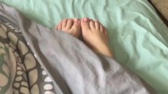 Girlfriend Stretching Sleepy Feet In The Morning
