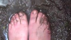 DIRTY FEET IN THE MUD