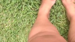 Plus Size Model Suggestive Feet In Grass