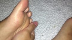 Teen Massages Glitter Lotion Into Her Feet