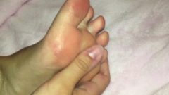 Pink Toed Teen Jerks Glitter Lotion On Feet