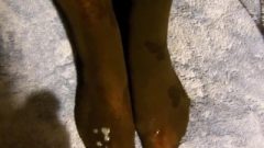 Two Cumshots On Feet In Black Stockings