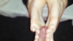 Footjob And Penis Rolling Between Feet With Cum Shot