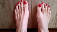 Arousing Long Toes With Red Toenails. Close – Olganovem